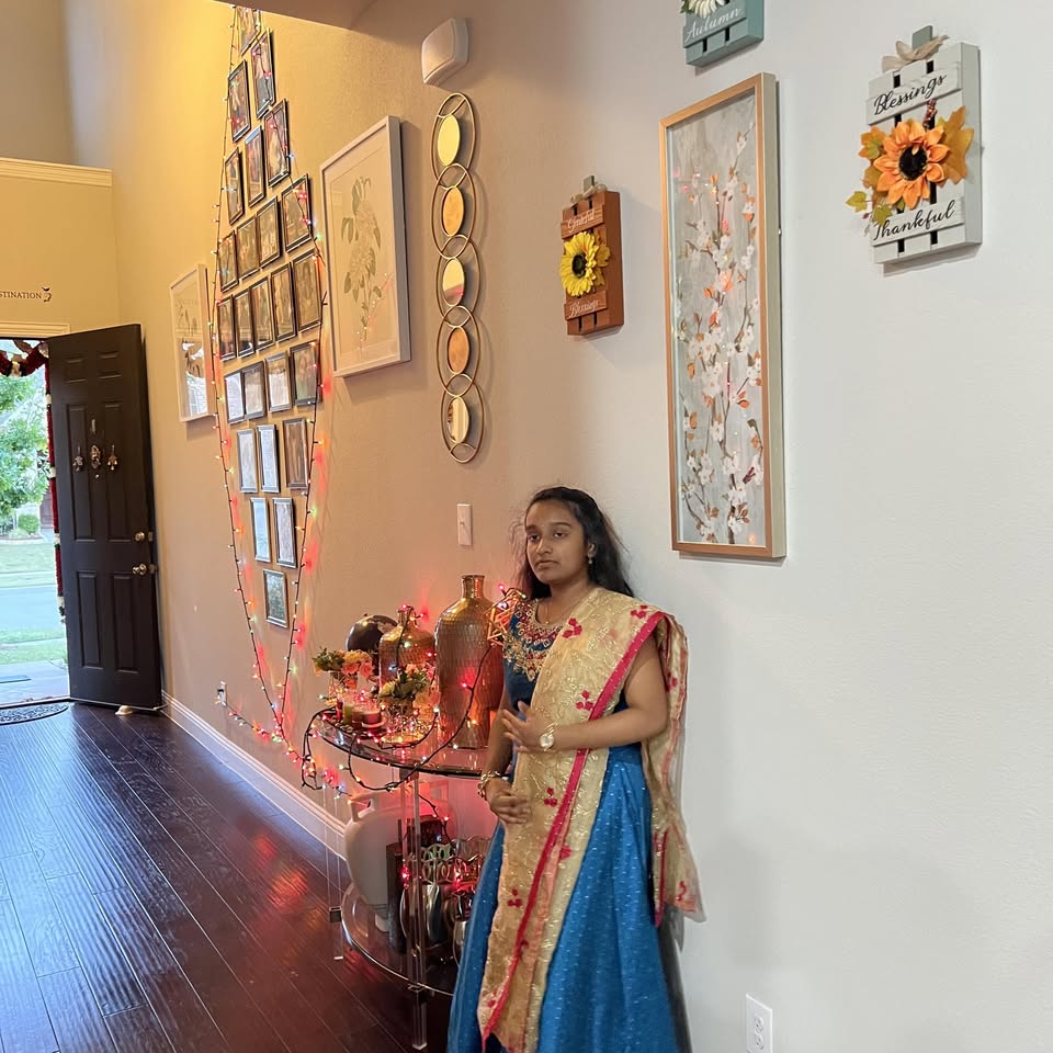 Full portrait of Veda Manchana in royal traditional attire